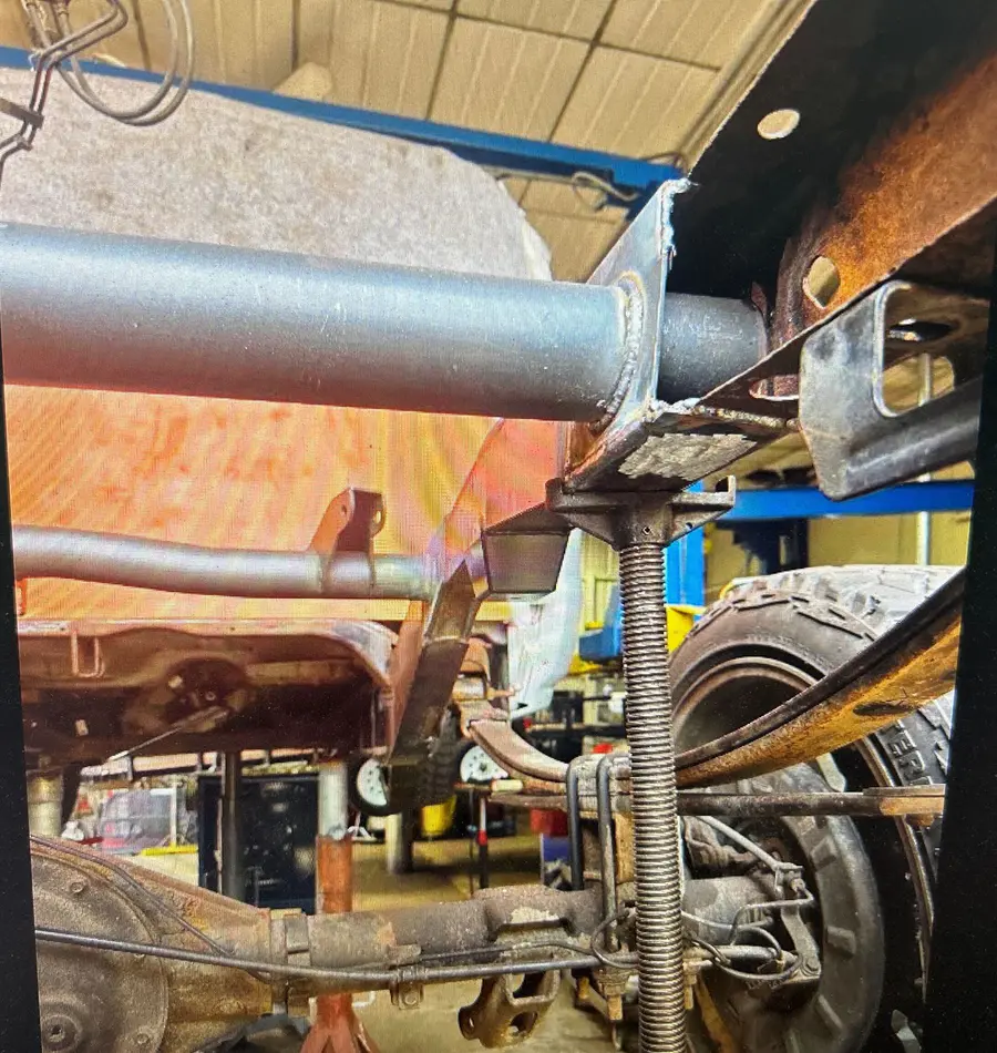A new tube crossmember welded between the frame rails